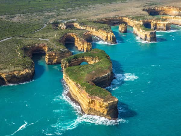 Sea-carved arches and gorges in the cliffs near the Twelve Apostles