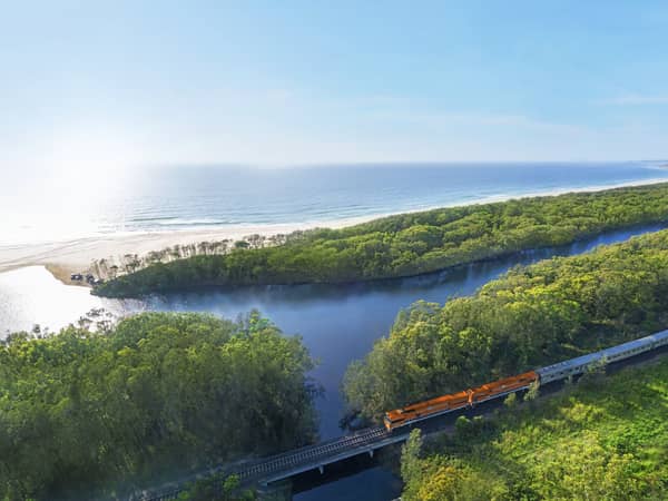 The Great Southern crossing a river near the coast at Coffs Harbour