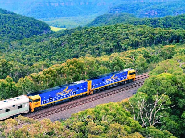 The Indian Pacific winding through the forests of the Blue Mountains