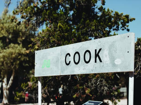 The station sign at Cook, a tiny settlement on the Nullarbor