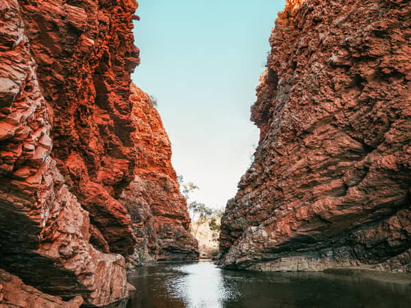 Red cliffs and still water at Simpsons Gap in the West MacDonnell Ranges